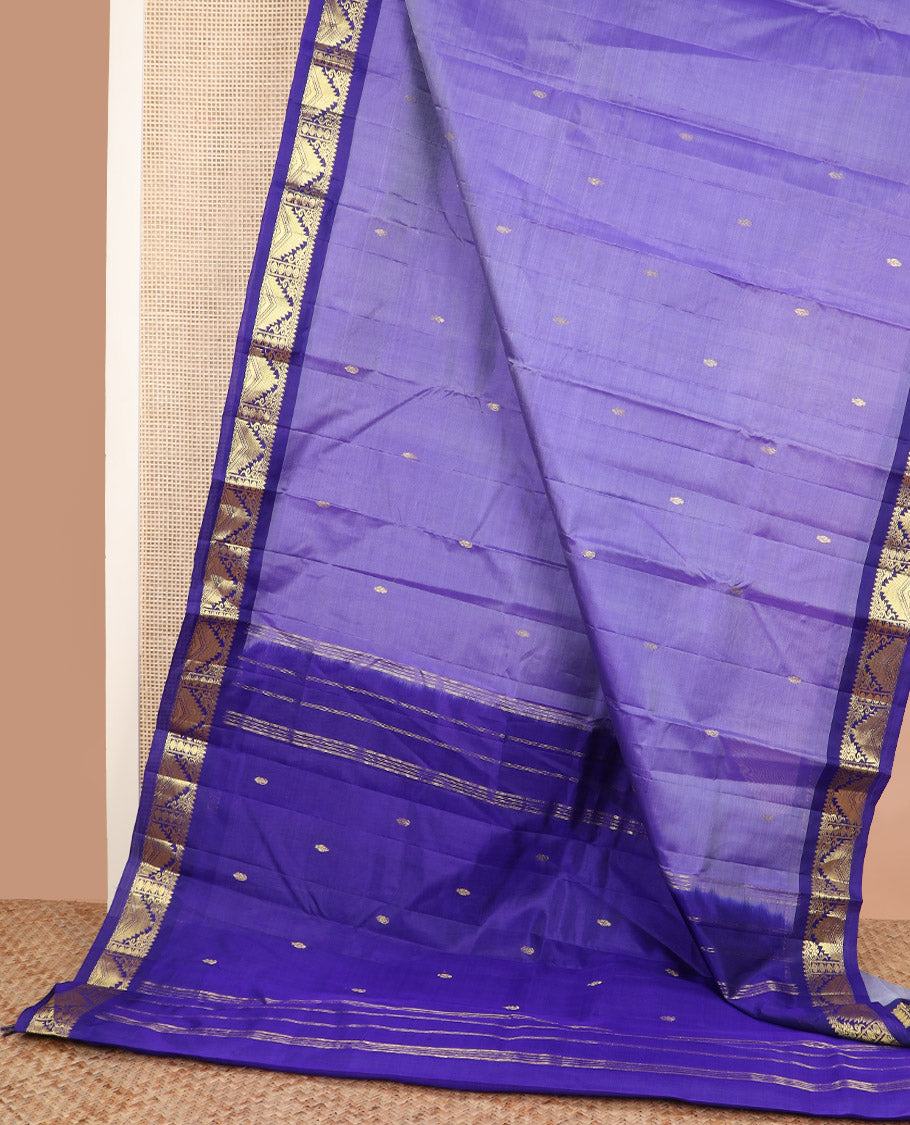 Lavender zari buttas Kanchipuram silk saree, contrast border of thilakam mokku, poun, thazampoo rekku, and neli designs, and zari design pallu