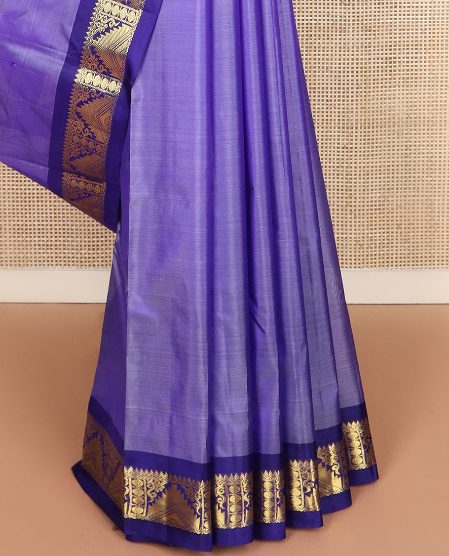 Lavender zari buttas Kanchipuram silk saree, contrast border of thilakam mokku, poun, thazampoo rekku, and neli designs, and zari design pallu
