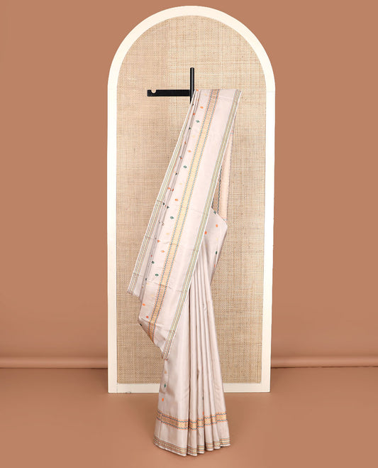 Cream thread buttas Kanchipuram silk saree, rettai pettu border of muthu, neli, and mayil designs, and jaal pallu