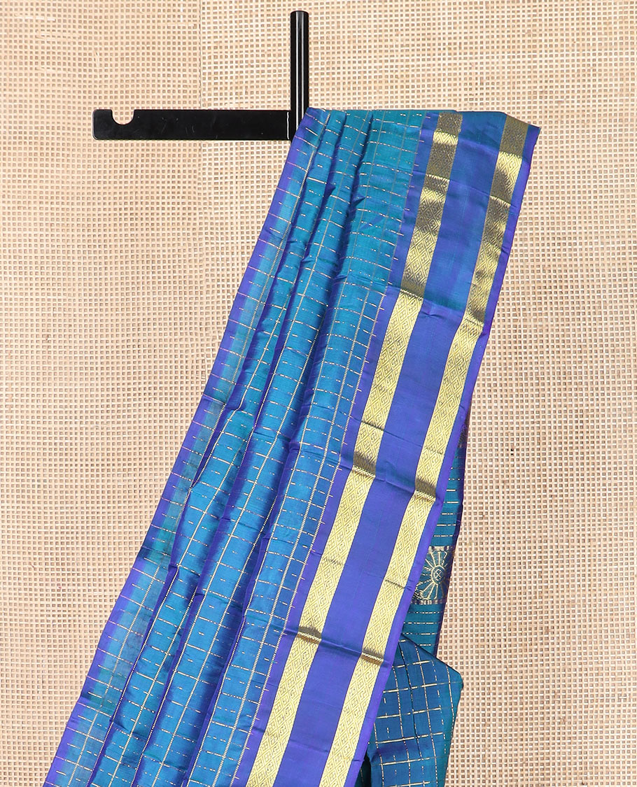 Blue zari checked Kanchipuram silk saree, rettai pettu diamond patterned border, and pallu of annam, kamalam, and manga designs