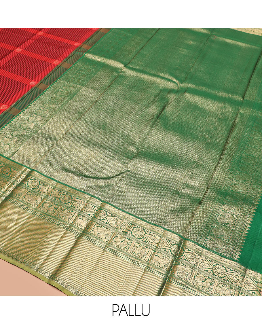 Red checked and buttas Kanchipuram silk saree, contrast border of muthu, rudraksham, chakram, jada nagam, yaanai, mayil,  and vanki designs, and intricate pallu