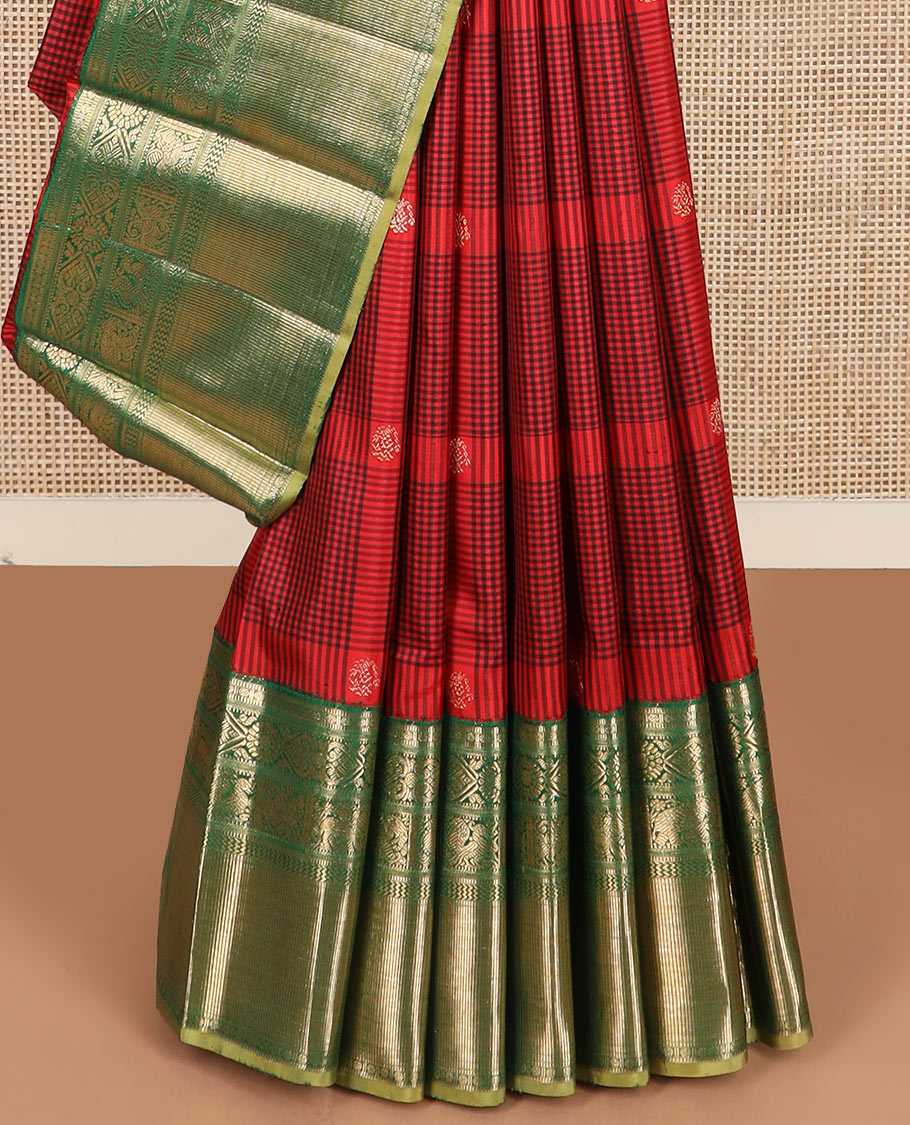 Red checked and buttas Kanchipuram silk saree, contrast border of muthu, rudraksham, chakram, jada nagam, yaanai, mayil,  and vanki designs, and intricate pallu