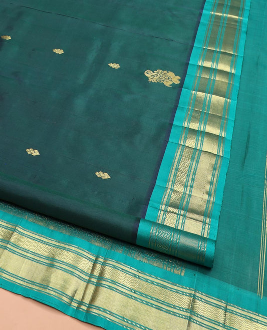 Green Kanchipuram Silk Saree, Finely Woven with Zari Buttas All Over Its Body, Complemented by Contrast One-sided Border Featuring Muthu, Kathir, and Vanki Designs, Zari Elevated Pallu of Jaal Designs, and Comes Without a Blouse