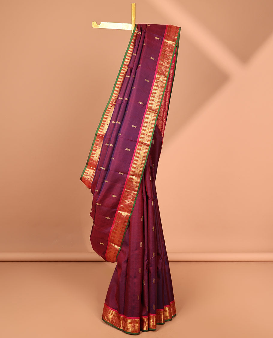 Maroon buttas kancheepuram silk saree with contrast border of sombu, banaras, paun designs & zari design pallu