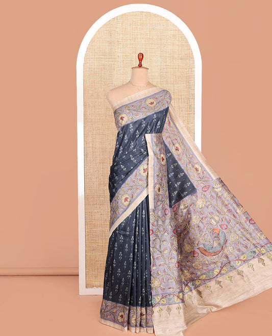 Blue Semi-Tussar Saree Adorned with Ikkat-Style Buttas, Complemented by a Contrast Floral Creeper Printed with Kantha Work Border, Pallu Featuring Floral and Peacock Print, and Paired with a Contrast Printed Blouse