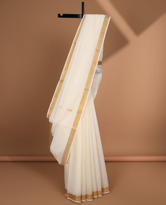 Cream zari buttas kerala saree, zari border & pallu of zari designs