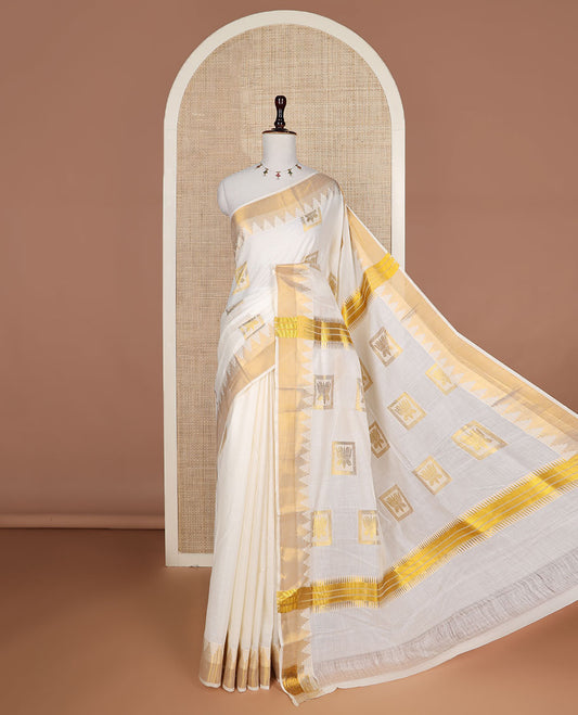 Cream zari Pichwai lotus buttas Kerala saree, zari temple border, and pallu of Pichwai lotus motifs