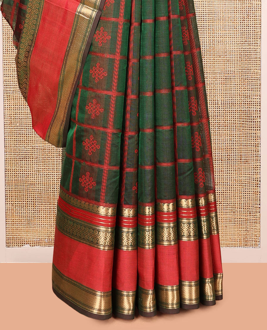 Green Kuppadam Silk Saree, Mesmerised with Kolam Butta Enclosed Checks, a Contrast Traditional Kolam Border, Pallu of Kolam Designs, and a Matching Blouse