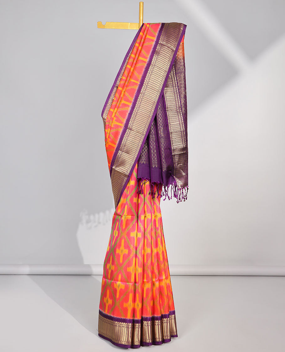 Red ikkat style geometric design soft silk saree with contrast zari border & zari ara maadam design pallu