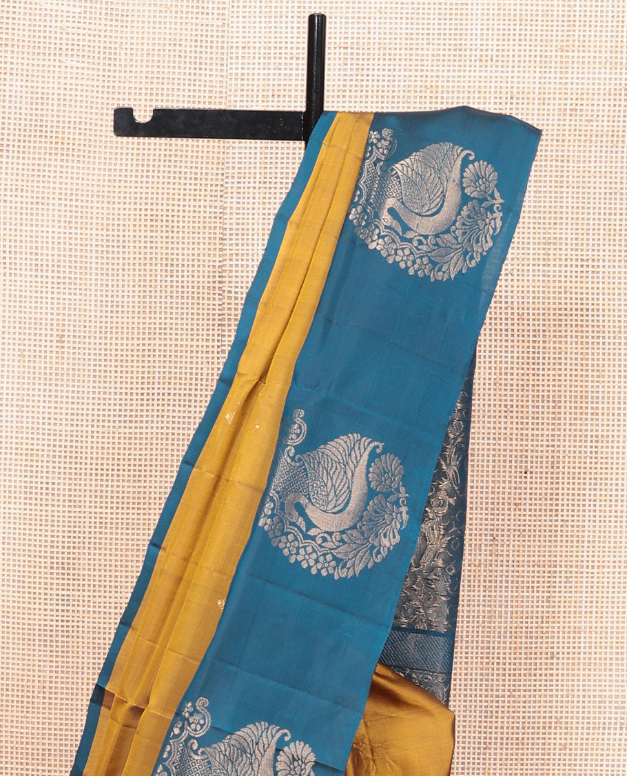 Mustard Mayuri Lite Silk Mix Saree, Graced with Zari Buttas, Complemented By Contrast Peacock-Paisley Butta Border, a Floral Vine Pallu, and a Contrast Blouse