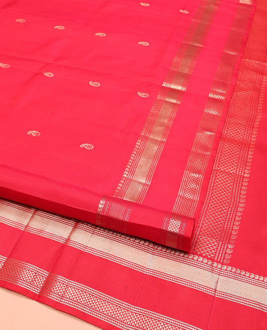 Red Mayuri Soft Silk Saree, Embellished with Manga Buttas on Its Body, Highlighted by Zari Border of Manga, Banaras, Mayil Kann, and Ara Maadam Designs, Pallu Elevated with Manga Designs in Zari, and Paired with a Matching Blouse