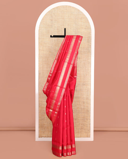 Red Mayuri Soft Silk Saree, Embellished with Manga Buttas on Its Body, Highlighted by Zari Border of Manga, Banaras, Mayil Kann, and Ara Maadam Designs, Pallu Elevated with Manga Designs in Zari, and Paired with a Matching Blouse