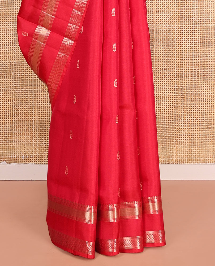 Red Mayuri Soft Silk Saree, Embellished with Manga Buttas on Its Body, Highlighted by Zari Border of Manga, Banaras, Mayil Kann, and Ara Maadam Designs, Pallu Elevated with Manga Designs in Zari, and Paired with a Matching Blouse