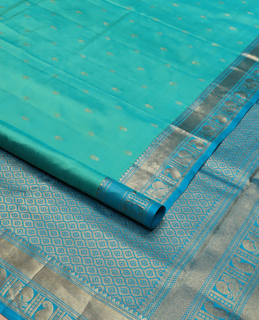 Blue zari buttas nine-yard silk saree, contrast traditional of thilakam, banaras, zari stripes, mayil, and manga designs, and jaal pallu