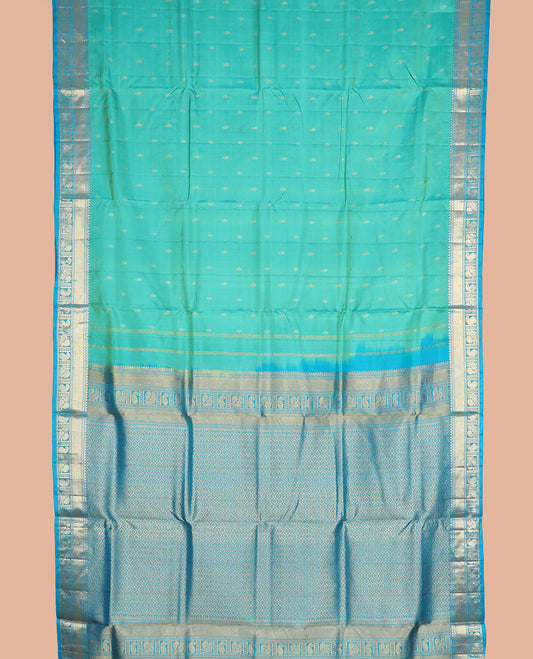 Blue zari buttas nine-yard silk saree, contrast traditional of thilakam, banaras, zari stripes, mayil, and manga designs, and jaal pallu