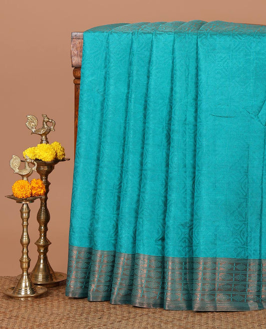 Blue embossed thread weave art tussar saree, copper zari border & pallu of intricate designs