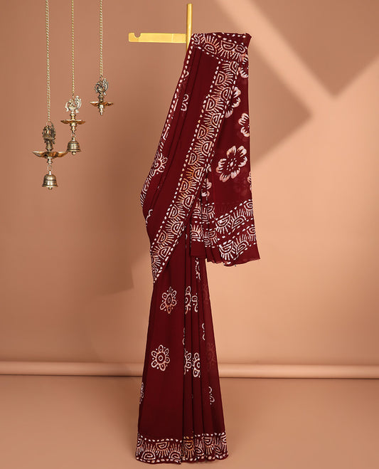 Maroon pathink print georgette saree with pathink print pallu & running blouse