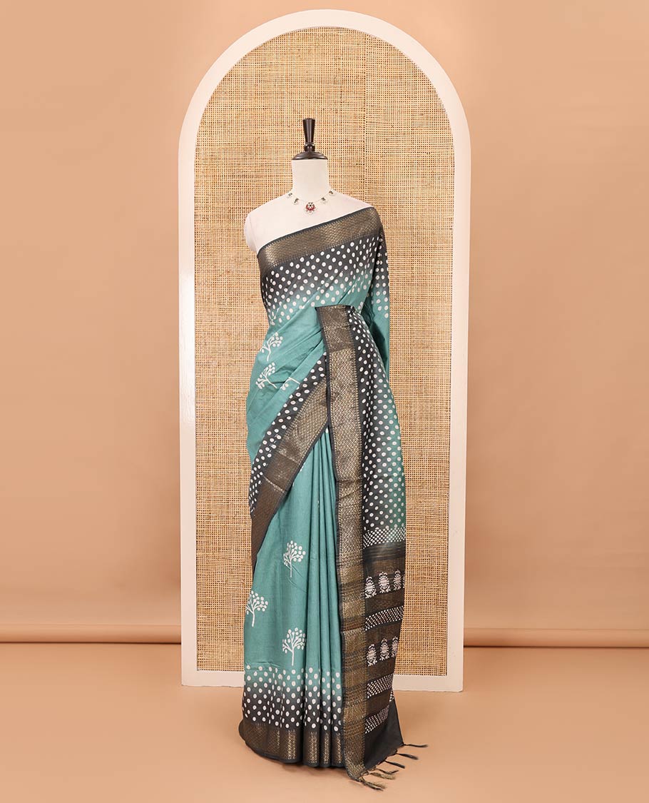 Ramar green batik printed Bhagalpuri cotton saree, contrast gold zari diamond-patterned border, printed pallu & pink blouse of print & zari work