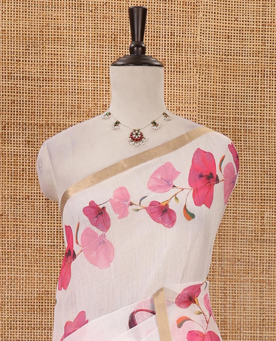 White-base pink color floral creeper printed linen saree, zari piping border, floral creeper print pallu & floral print blouse