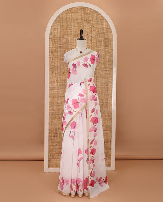 White-base pink color floral creeper printed linen saree, zari piping border, floral creeper print pallu & floral print blouse