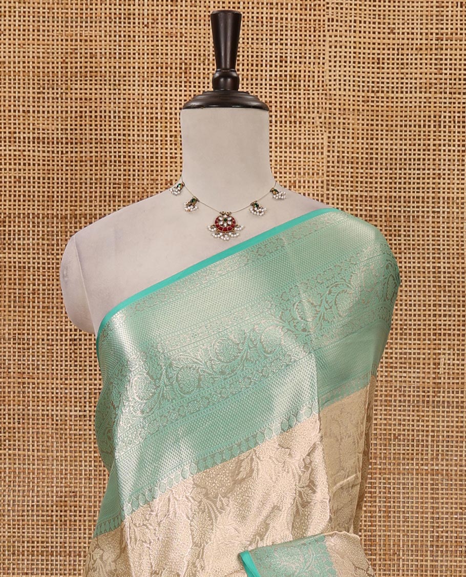 Cream zari jacquard tissue banaras saree, contrast traditional zari design border, intricate pallu & contrast jacquard blouse