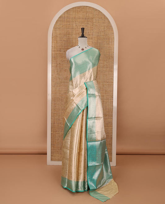 Cream zari jacquard tissue banaras saree, contrast traditional zari design border, intricate pallu & contrast jacquard blouse