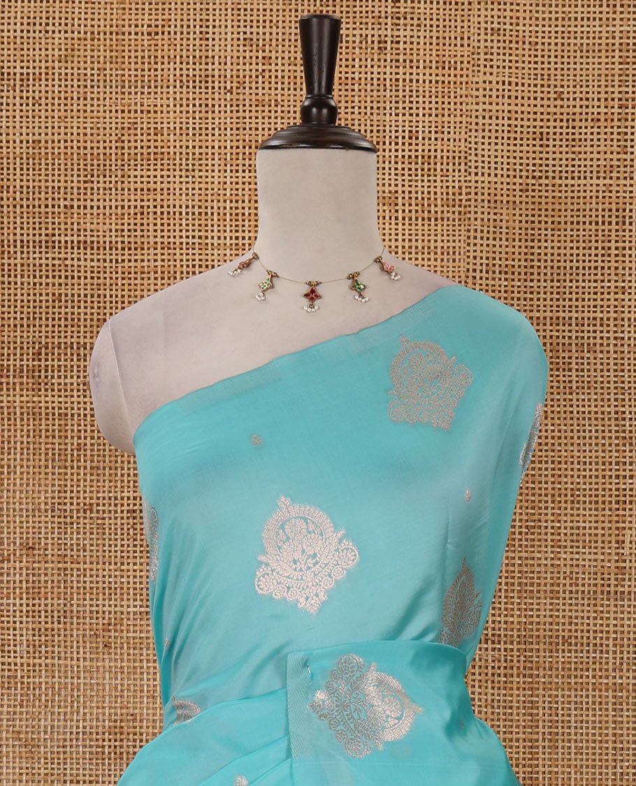Borderless sea blue golden zari buttas woven mulberry silk saree, contrast rose floral digitally woven pallu & zari design blouse