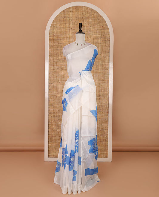 Cream floral placement-style printed Marble chiffon saree, zari border & contrast sky blue gotta patti work & mixed embroidered blouse