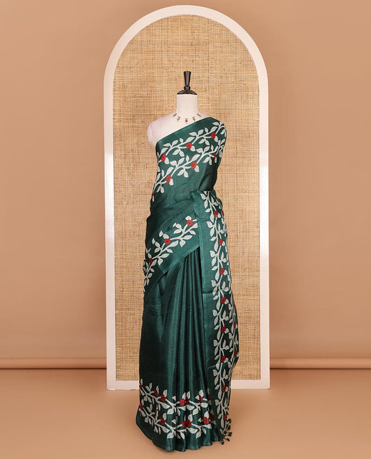 Green plain khadi cotton saree, floral creeper printed border, and pallu with small buttas printed blouse
