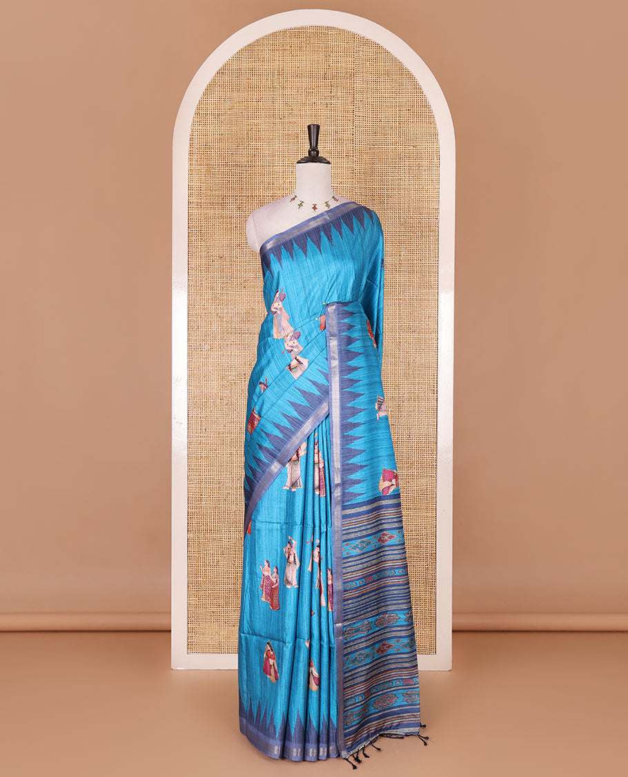 Dark blue Radha motifs printed katan silk saree, contrast temple border, ikkat motifs woven pallu, and contrast printed pallu