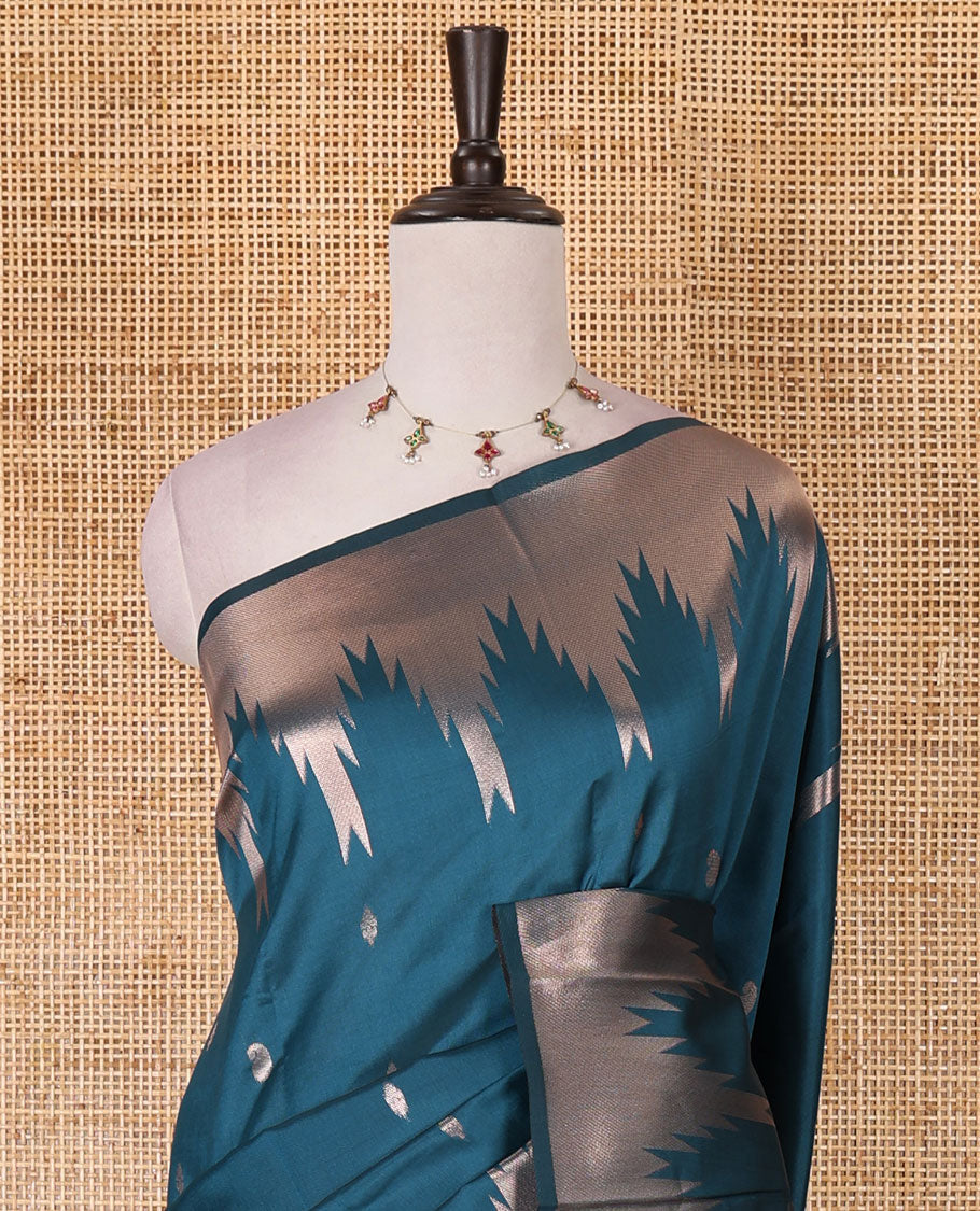 Blue zari buttas kanchi silk saree, temple zari border, zari-rich jaal pallu, and zari motifs woven blouse