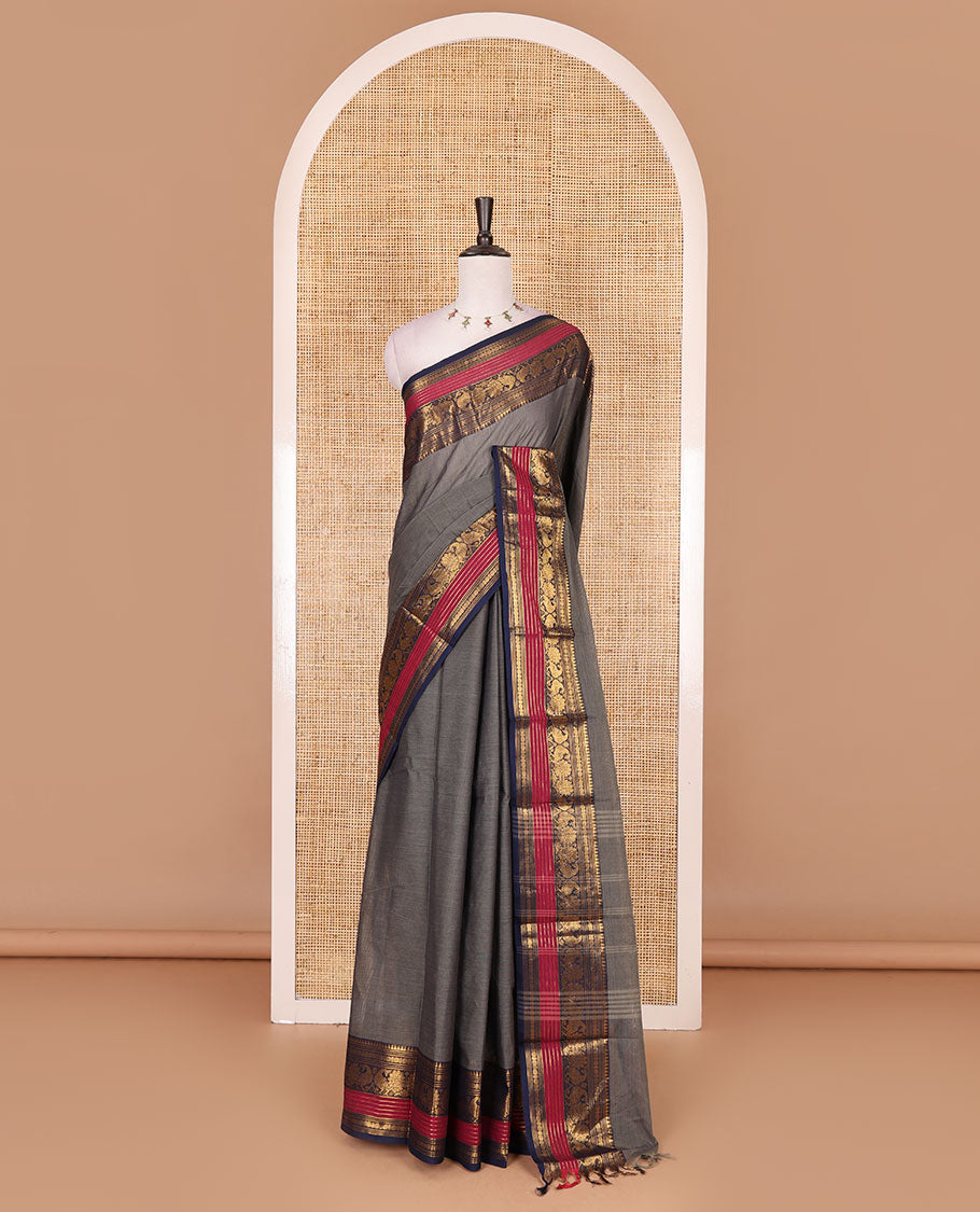 Grey plain Chettinad cotton saree, contrast rettai rettu annam and temple motif zari border, striped pallu, and matching blouse