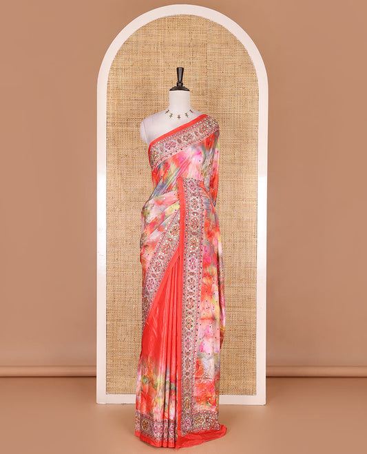 Red-base kaleidoscopic colored floral printed with mirrorwork masakali saree, printed with mirrorwork border and pallu, along with a matching printed blouse