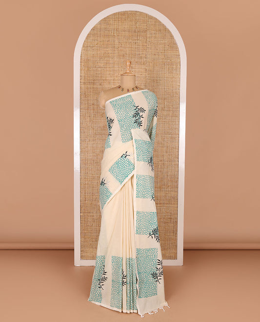 Cream plain South cotton saree, floral and honey hive printed border, a matching printed blouse, and a contrast floral vine printed blouse