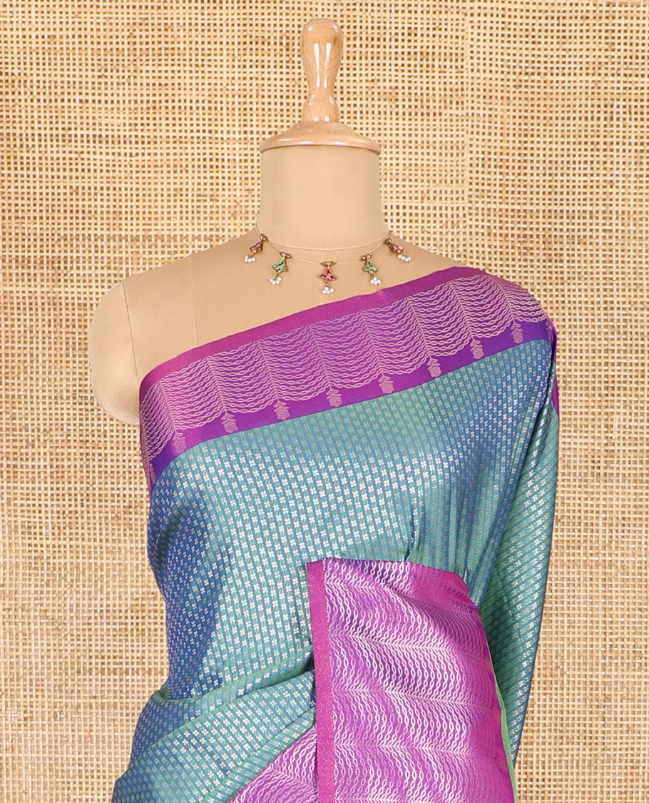 Blue small zari buttas woven elite soft silk saree, contrast zari woven scallop satin border, jaal pallu, and a contrast chakram zari motifs blouse