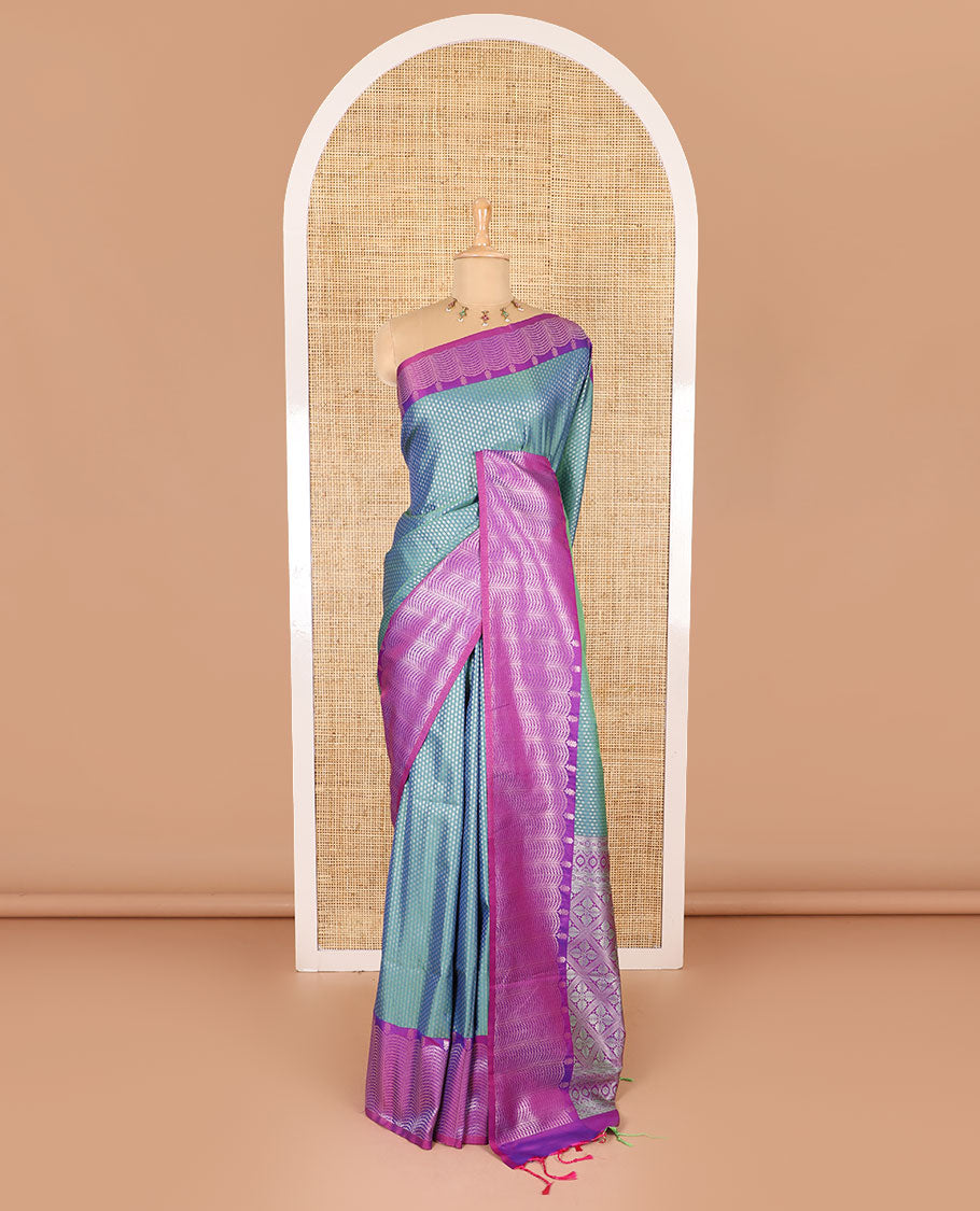 Blue small zari buttas woven elite soft silk saree, contrast zari woven scallop satin border, jaal pallu, and a contrast chakram zari motifs blouse