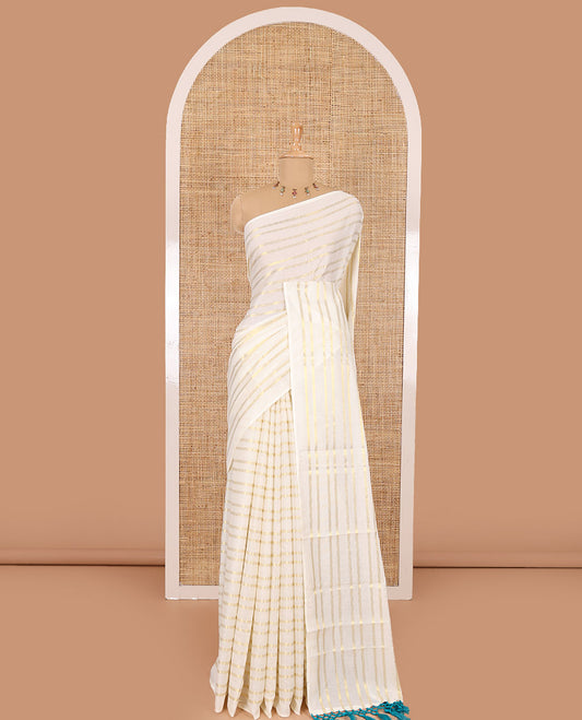Borderless cream and ramar blue horizontal zari muthu striped Kerala cotton saree, self-pallu with tassels and a matching blouse