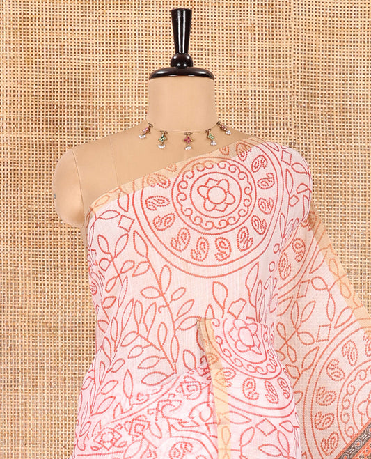 white bandhani-style floral and chakra printed saree, zari piping border, contrast ajrakh printed pallu, and contrast ajrakh printed blouse