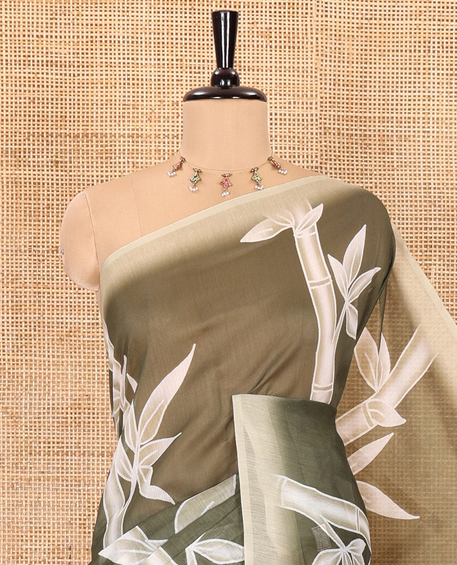 Olive green bamboo motifs printed chanderi cotton saree, contrast plain border, bamboo motifs printed pallu, and a contrast unique motifs printed blouse