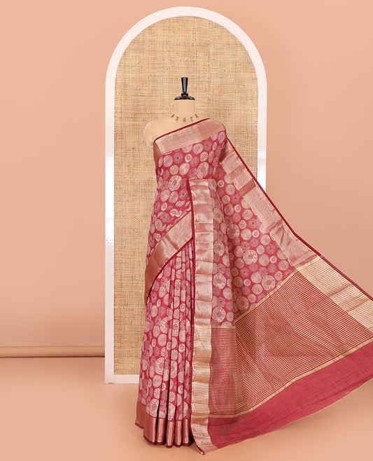 Maroon lotus-leaf style printed semi-tussar saree, traditional zari border, zari striped pallu, and a matching blouse