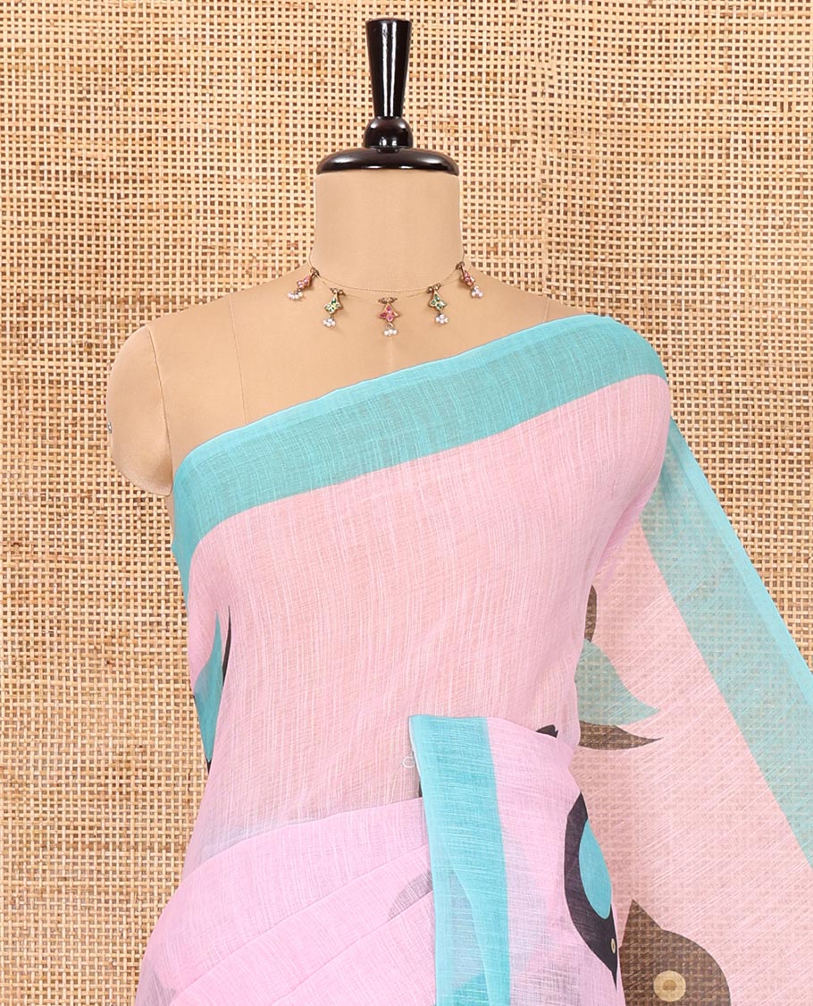 Baby pink motifs linen cotton saree with contrast plain border , birds mofits pallu and leaf printed blouse