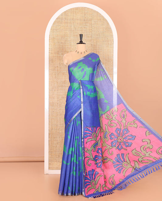 Royal blue shibori printed linen cotton saree, piping border, contrast floral printed pallu, and a contrast floral printed blouse
