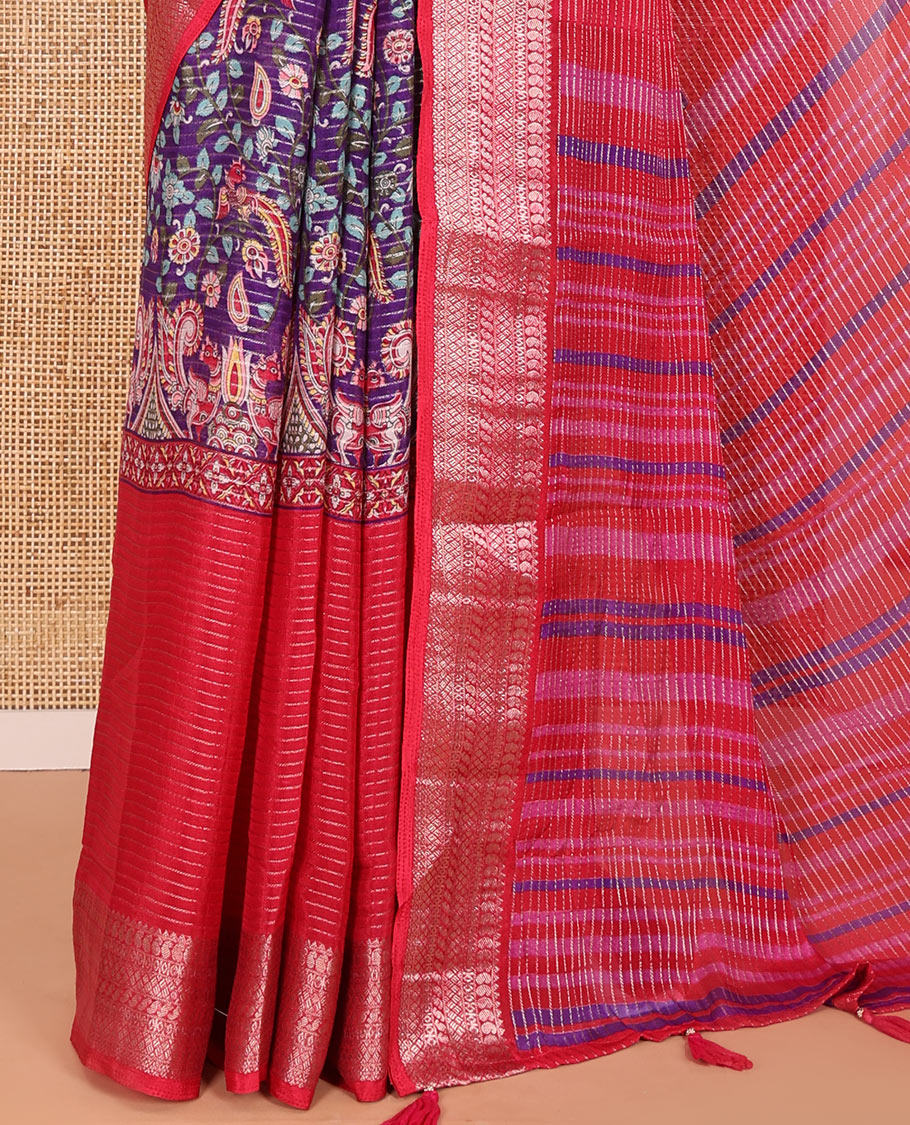Rani Pink Viscose Georgette Adorned with Horizontal Zari Stripes and Kalamkari Flora-Paisley Prints, Complemented by a Traditional Zari Border, a Printed Pallu with Stripes, and a Matching Blouse