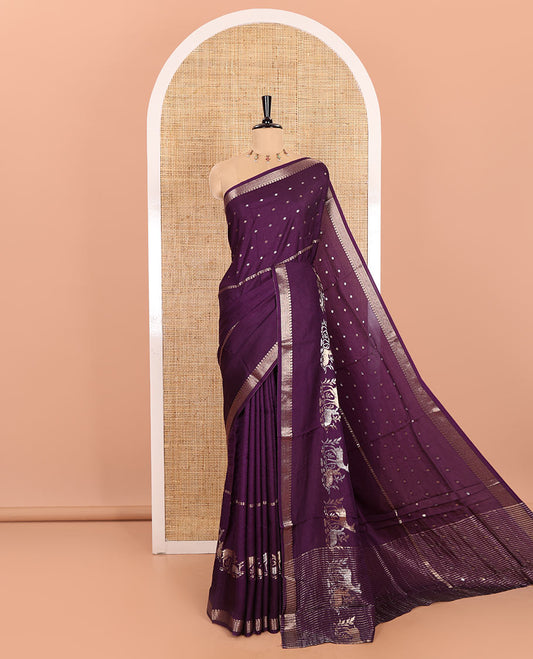 Dark Violet Russian Silk Saree Adorned with Gold Zari Buttas and Deer Motifs, Featuring a Subtly Sparkling Traditional Zari Border, a Pallu with Zari Stripes, and a Contrast Blouse Woven with Peacock Meena Buttas