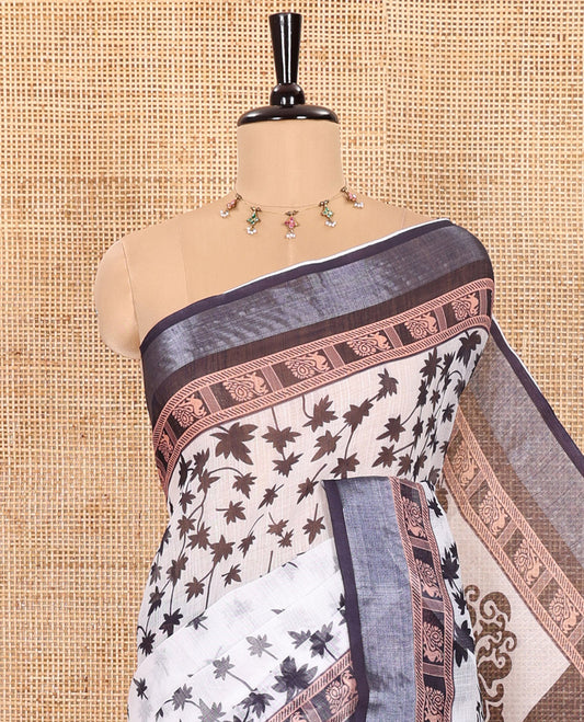 White and Black Linen Cotton Saree Featuring Field Maple Leaf Motifs Printed All Over the Body, Complemented by a Contrast Zari and Peacock-Printed Border, Pallu of Geometric Print, and Paired with a Contrast Checked Blouse