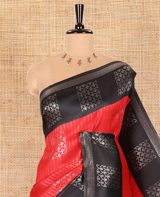 Red Kanchi Silk Saree Highlighted by Zari Stripes and Scallop Buttas All Over Its Body, Complemented by Contrast Border of Zari Designs, Gracefully Embellished Pallu of Intricate Designs, and Paired with a Contrast Blouse