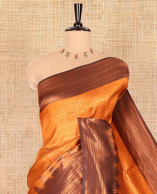 Rust Orange Kanchi Silk Saree Enriched with Zari Checks All Over Its Body, Complemented by Contrast Traditional Zari Design Woven Temple Border, Elegantly Decked Up Pallu, and Paired with a Contrast Blouse