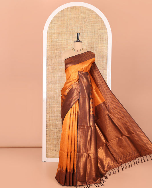 Rust Orange Kanchi Silk Saree Enriched with Zari Checks All Over Its Body, Complemented by Contrast Traditional Zari Design Woven Temple Border, Elegantly Decked Up Pallu, and Paired with a Contrast Blouse
