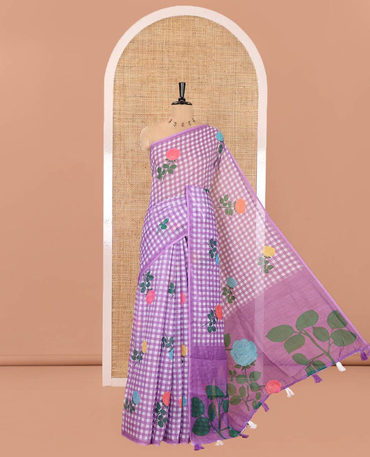 Borderless Lavender Linen Cotton Saree, Enlivened with Rose Floral Buttas and Checked Design on Its Body, Pallu Pictures a Beautiful Rose Floral Motifs, and Paired with a Matching Blouse