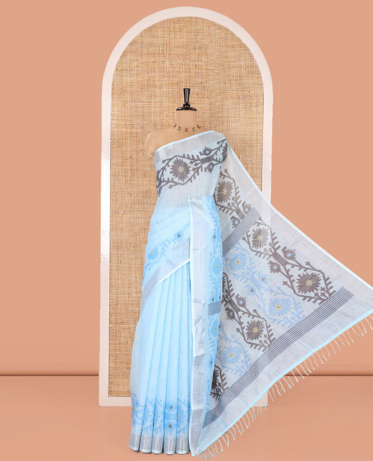 Blue Plain Linen Cotton Saree, Subtly Sparkled Zari Border of Jamdani-Style Leaf-Floral Designs, Pallu Depicting Jamdani-Style Designs, and Paired with a Matching Blouse
